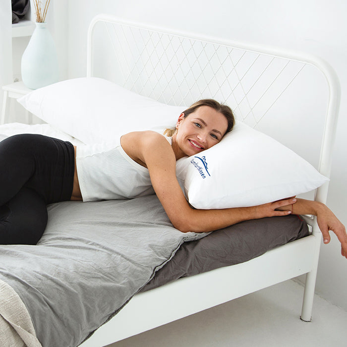 Ergonomic side sleeper pillow –